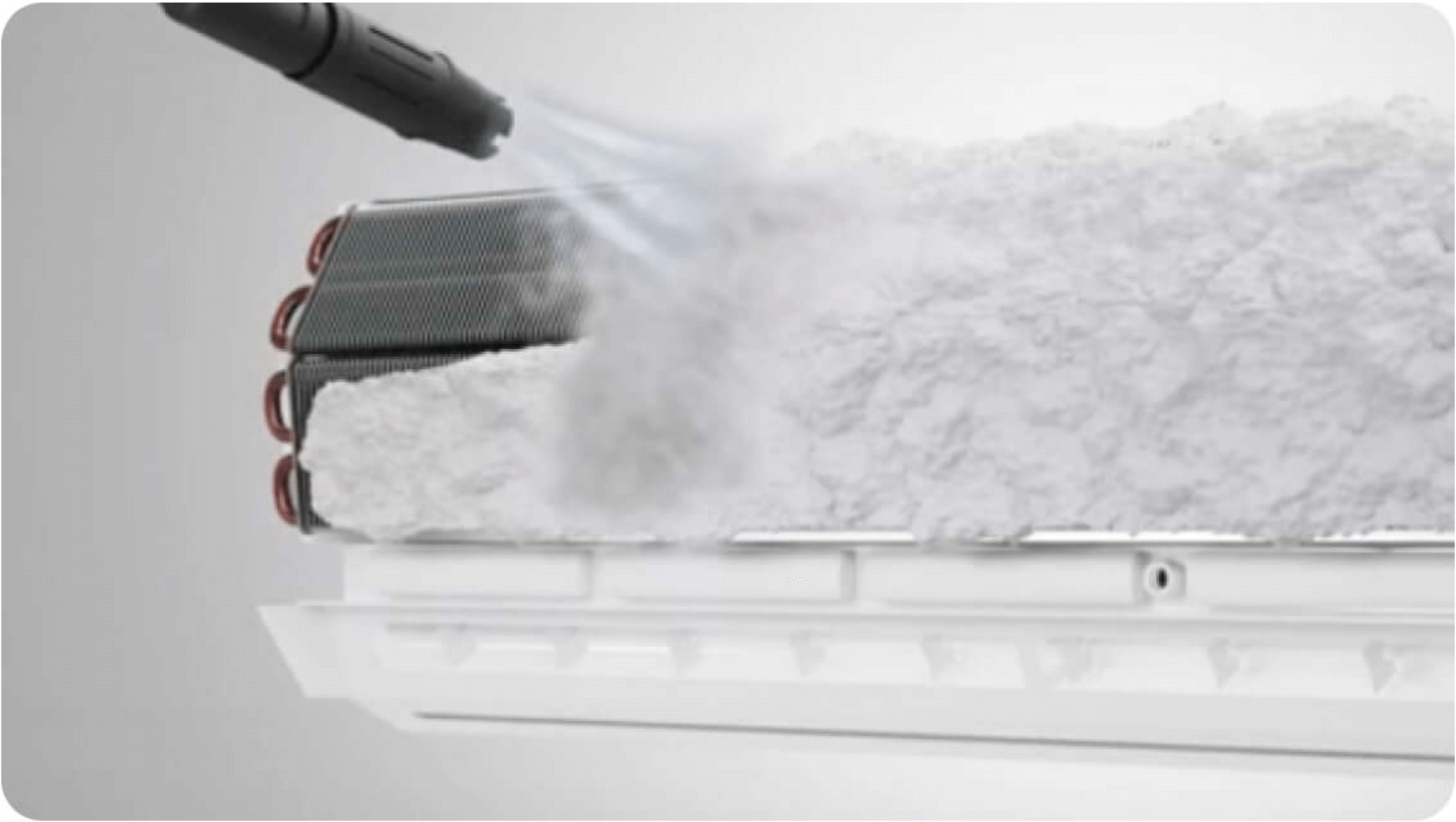 Split AC on a wall being cleaned by Foam