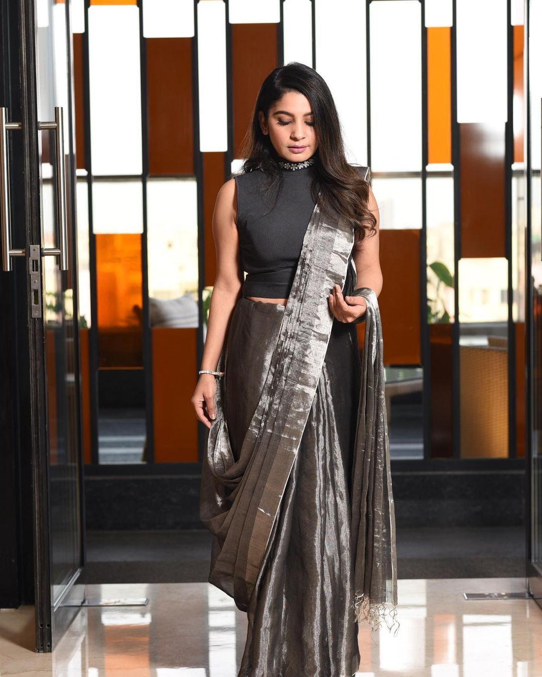 Thin pleated saree drape