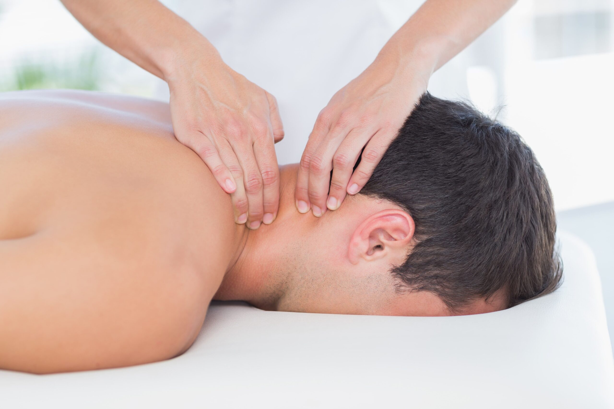 How Regular Massage Therapy Reduces Neck & Back Pain