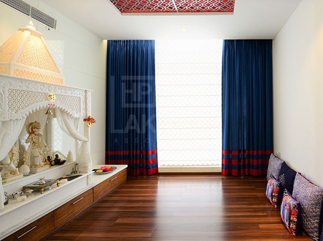 Marble Pooja Mandir Design With Wooden Flooring and False Ceiling